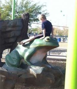 Matt sitting on a frog
