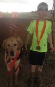 A boy and his dog at a Special Spartans race