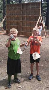 The twins showing off their finisher medals at Terrain Racing Flagstaff