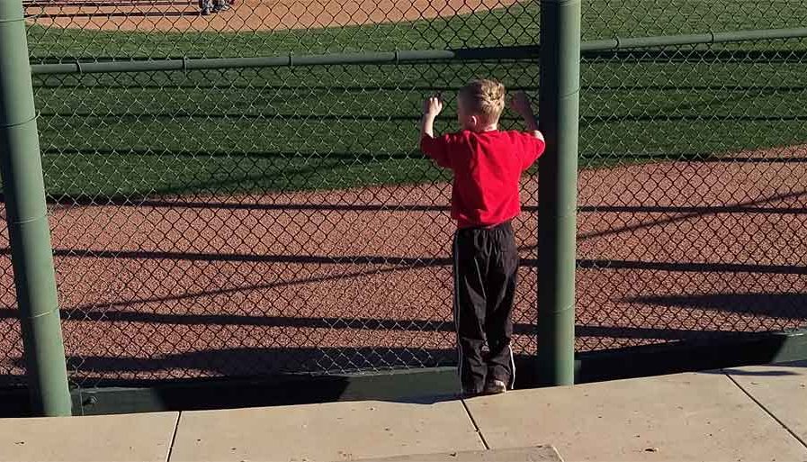 Matt watching a baseball game Matt watching a baseball game