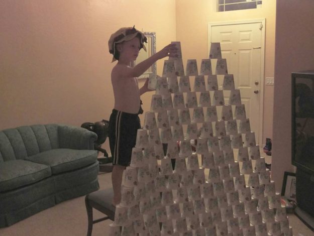 Stacking paper cups into a pyramid