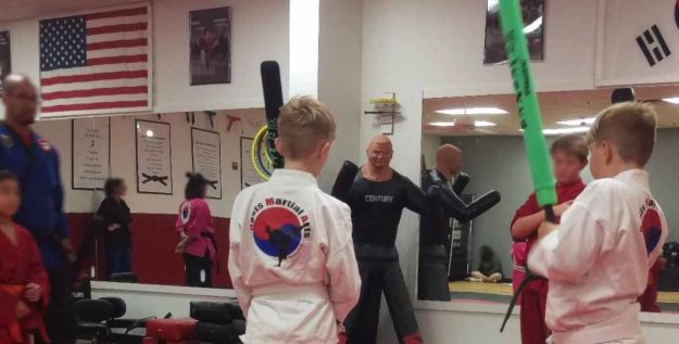 Martial Arts class and beginning weapons training Martial Arts class and beginning weapons training