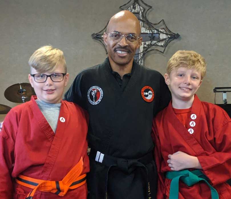 Matt, his brother and Taekwondo instructor Matt, his brother and Taekwondo instructor